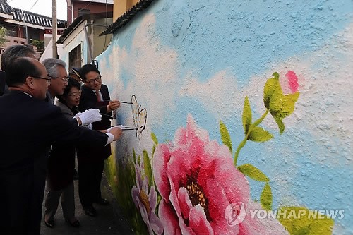 김길태 사건 골목길에 범죄 예방 벽화