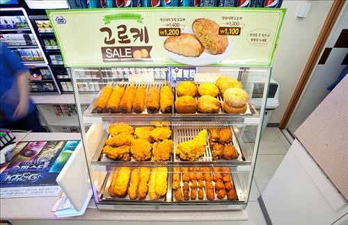 굽고 튀기고…편의점, 빵집·피자가게와 경쟁