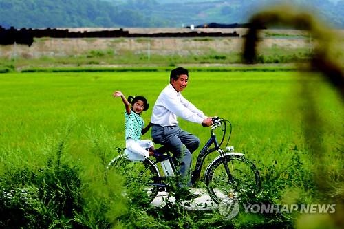 자전거타는 노무현 전 대통령