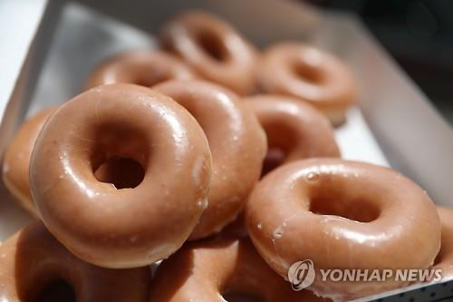 커피 앤 도넛? 커피업계 큰손 JAB, 크리스피 크림 인수