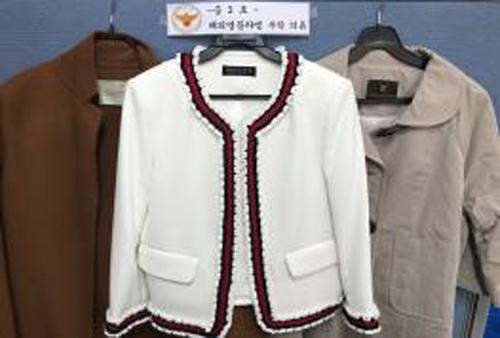 보세 옷 해외명품으로 속여 4억 판매…라벨갈이 적발