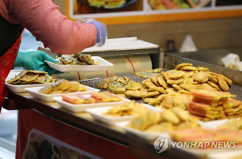 전 부치는 상인