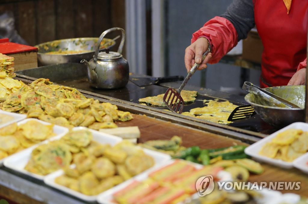 전 부치는 상인