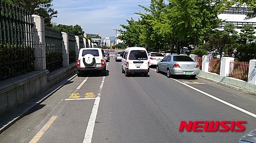 주차선 규격 무시한 노상주차장