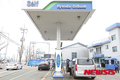 유가 하락 속 셀프로 저렴한 주유