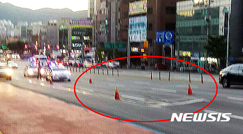 부풀어 오른 안양 도로 통제 중인 경찰