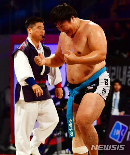 김진 이겼다