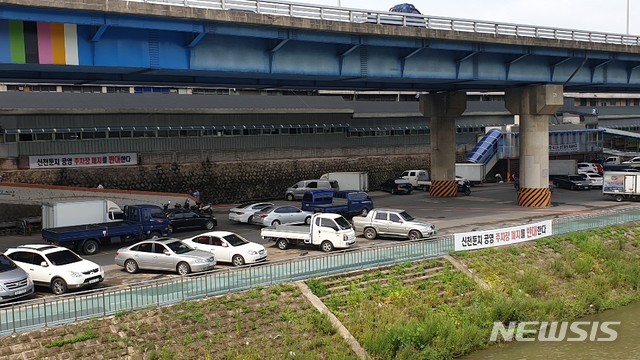 대구 칠성 야시장 개장 9월로 연기…주차장 축소 논란