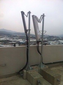 “두통 유발.. 옥상에서 빼” 휴대폰 중계기 갈등