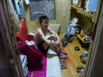 무더위에 신음하는 쪽방촌