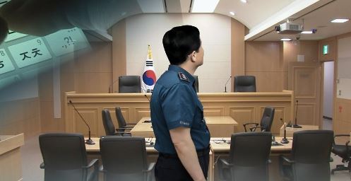 '초과수당 부당 수령' 동료 눈감아준 경찰관..."강등 마땅"