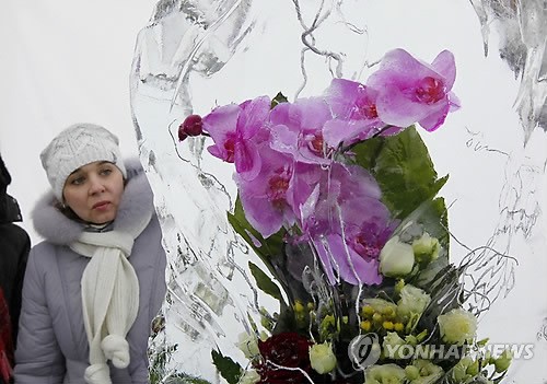 UKRAINE EXHIBITION ICE COVERED FLOWERS