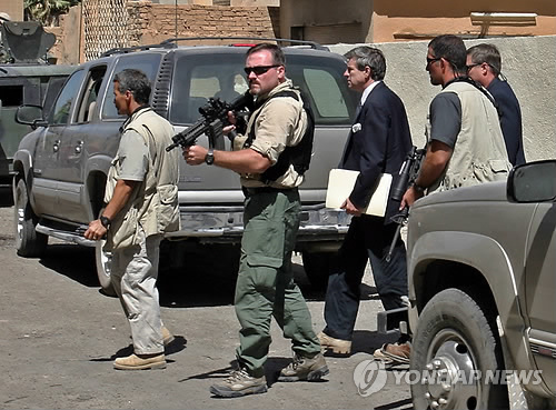 FILE IRAQ US JUSTICE CONFLICT