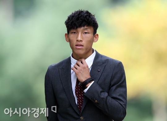 [포토] 김승규 옷 매무새를 단정히