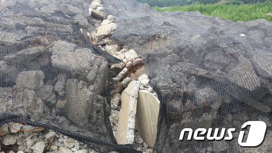 서산-황금산 간 국도 공사 건축폐기물 마구 버려 말썽