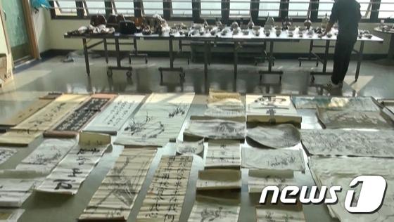 빈집털이범 집 골동품 400여점…주인 찾습니다
