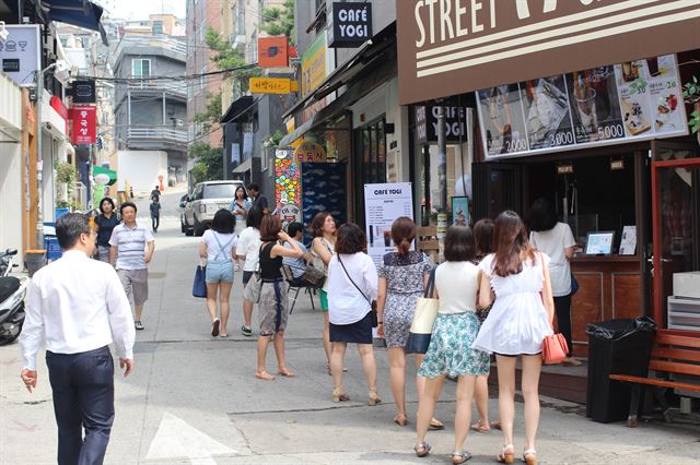 신흥 골목상권 잔혹사... 경리단길, 봄은 짧았다