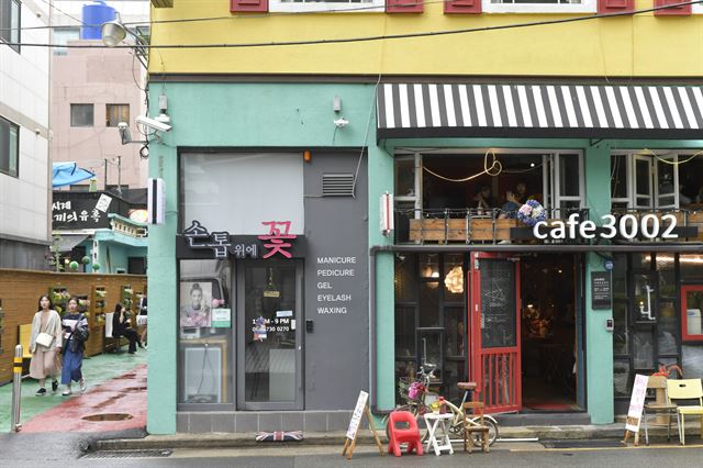 철물점 사라진 자리… 골목골목 스며든 커피향 “해운대 안 부럽네”