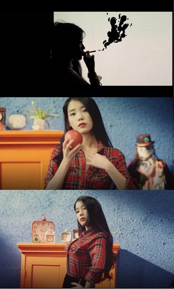 아이유 스물셋, 흡연 그림자·사과 넣고 글래머… 뮤직비디오에서 파격적인 이미지 변신