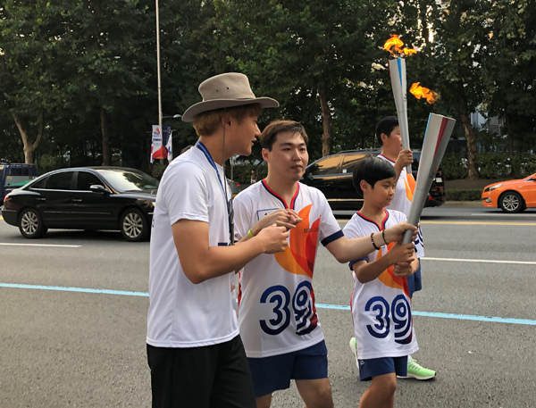 서울뇌성마비복지관  제100회 전국체전 성화 봉송 주자  4명 참가