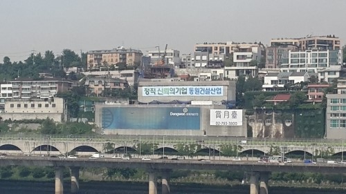 “과태료쯤이야”…불법광고 단속 비웃는 ‘동원건설산업’