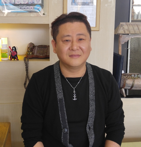 전동준 미용산업협동조합 이사장 이민자·탈북여성 차별의 벽 없어야죠