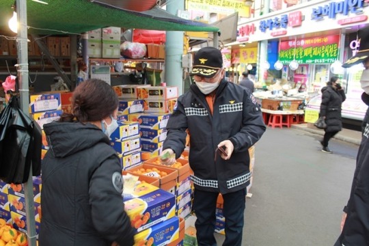 울산소방본부, 수암시장서 소상공인 돕기 릴레이 캠페인 동참