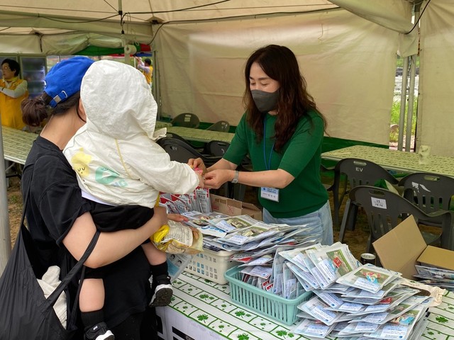 진천원광은혜의집, 농다리축제장서 마스크 무료 배부