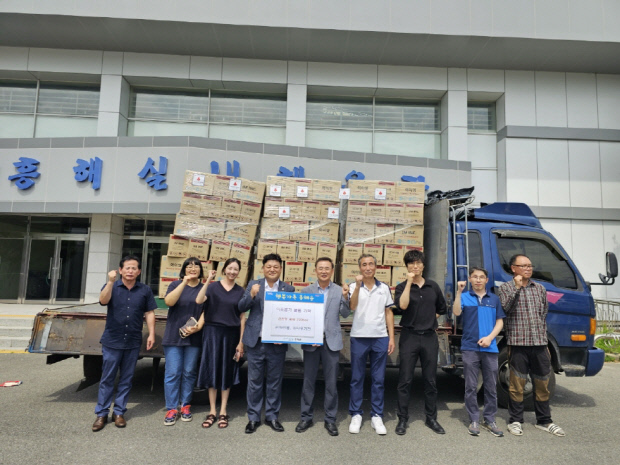 나우기전·아이엠, 포항 흥해읍에 후원물품 전달