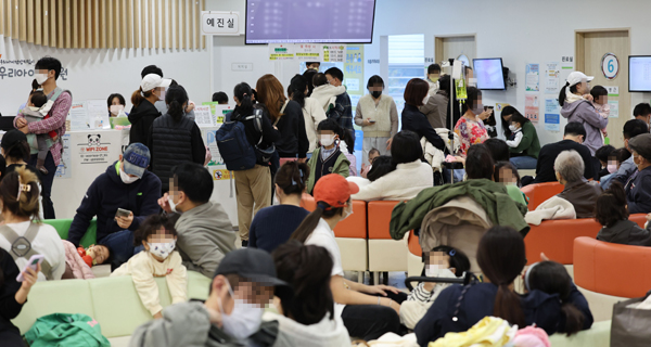 빨라진 독감 유행··· 병원마다 북새통