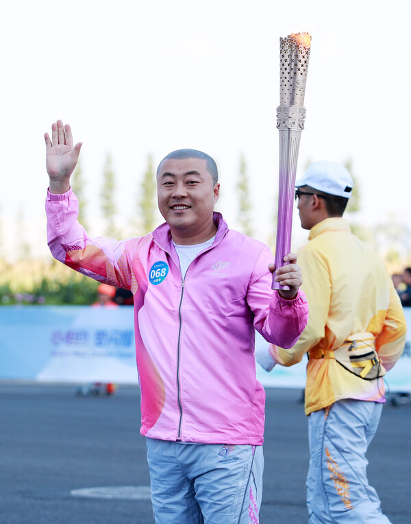 보배반점 대표 김진혁 선수단장이 이끄는 2022 항저우 장애인 AG 개막 